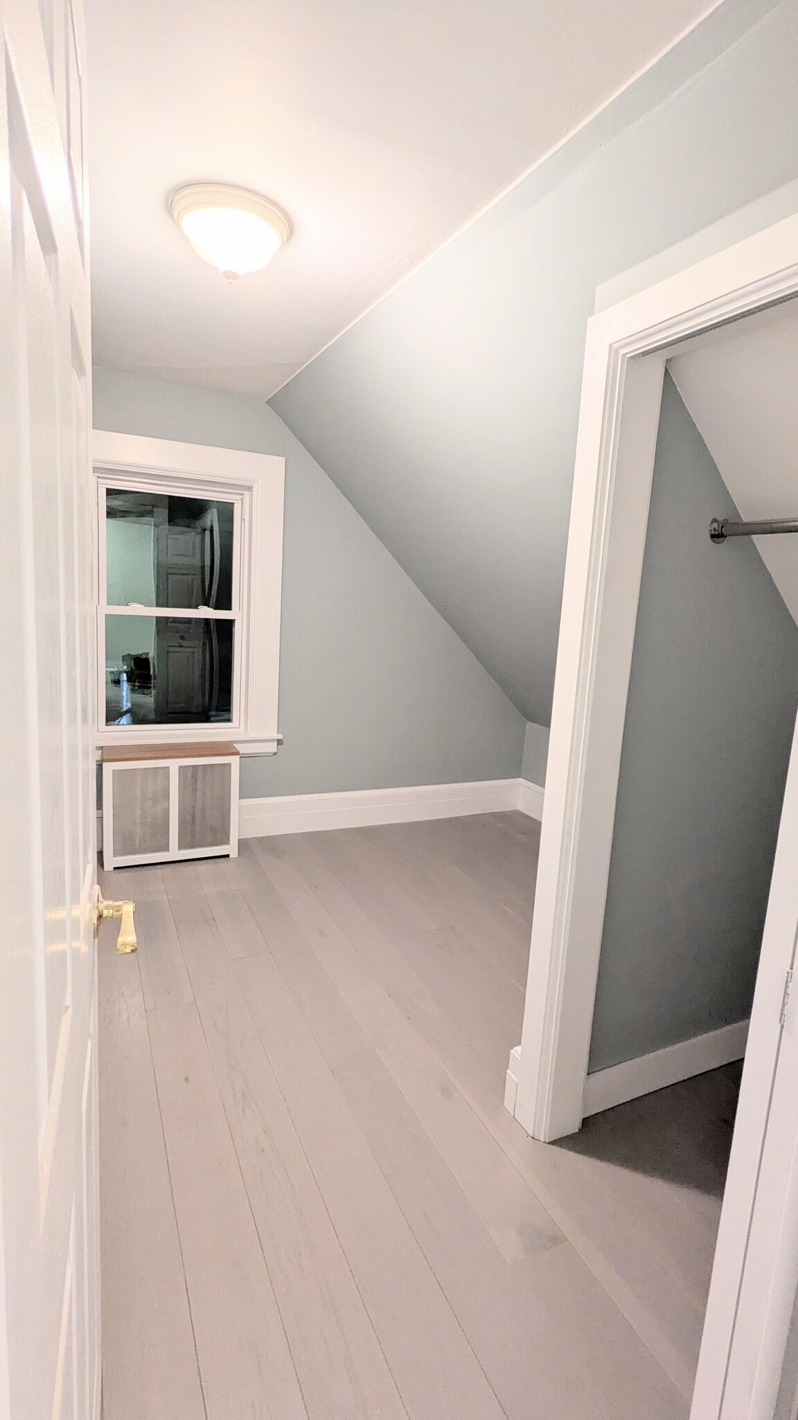 Second bedroom with new oak hardwood flooring - 536 Bridge St