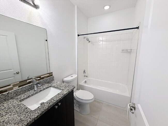 Building Photo - Welcome home to this gorgeous 4-bedroom, 2-bath home!