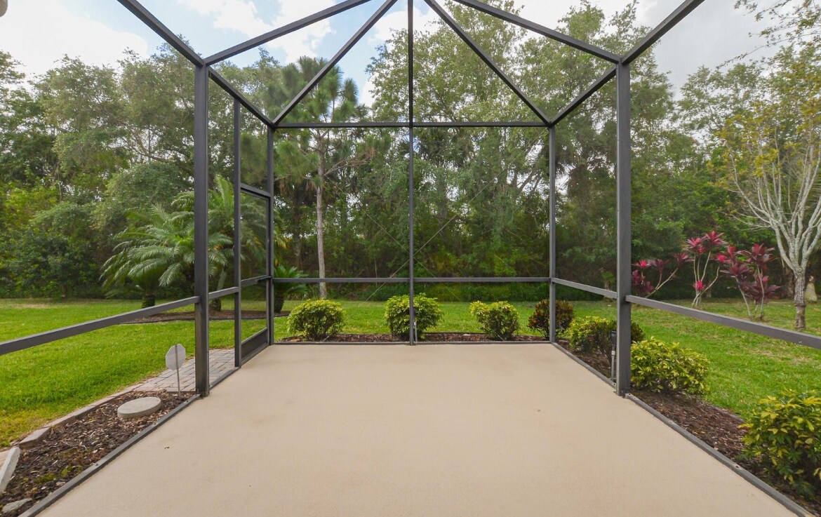View looking out onto patio and preserve - 798 SW Munjack Cir
