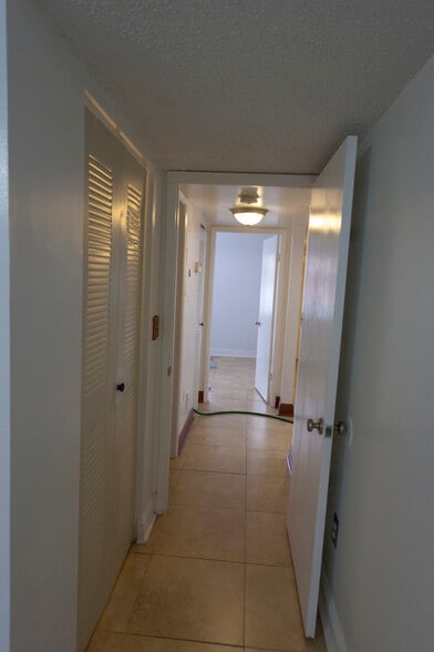 Hall looking from Master bed to smaller bedroom - 6081 W 24th Ave