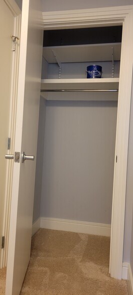 Internal coat closet with 1 fixed, and 1 adjustable shelf - 800 4th St SW