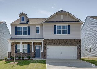 Building Photo - Spacious 4-Bed Gem with 2.5 Baths in Fuqua...