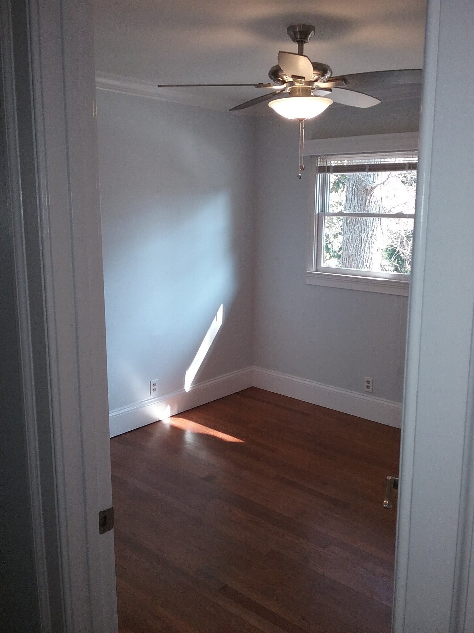 1st bedroom (each has a fan and nice windows) - 701 Rosalyn Dr