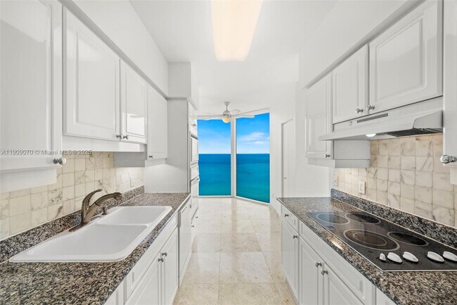 Building Photo - 4775 Collins Ave