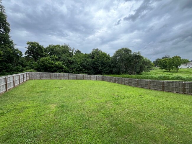 Building Photo - Large Home Coming Soon! Close to Fort Campbell with Large Fenced Yard