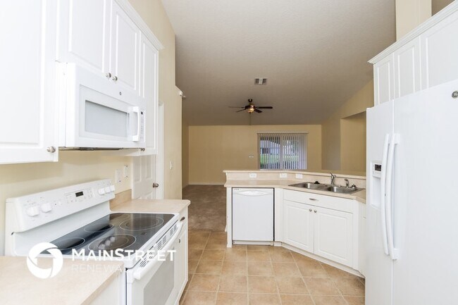 Building Photo - 5690 Cinnamon Fern Blvd