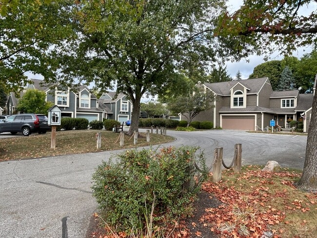 Building Photo - Charming Condo in a Can't-Miss Location – Private Deck, Garage, and Nature-Filled Community