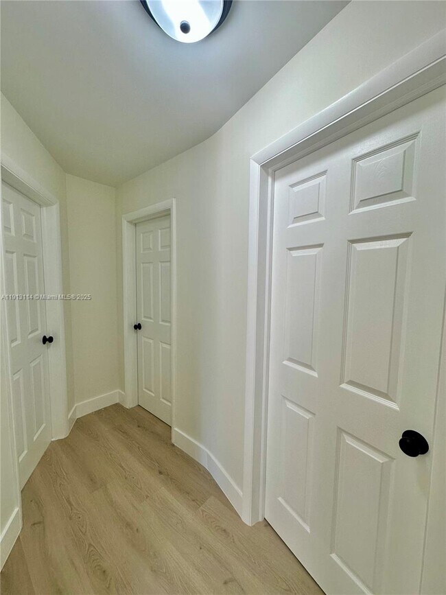 Building Photo - 6570 NW 6th Ct