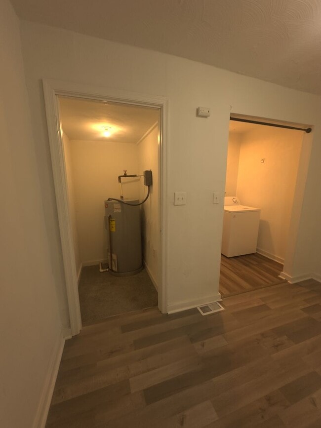 Building Photo - Three Bedroom Available Soon!