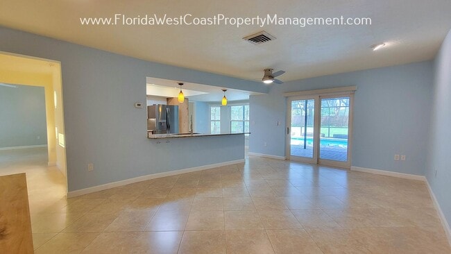 Building Photo - CLASSIC SARASOTA POOL HOME WITH UPDATES AN...