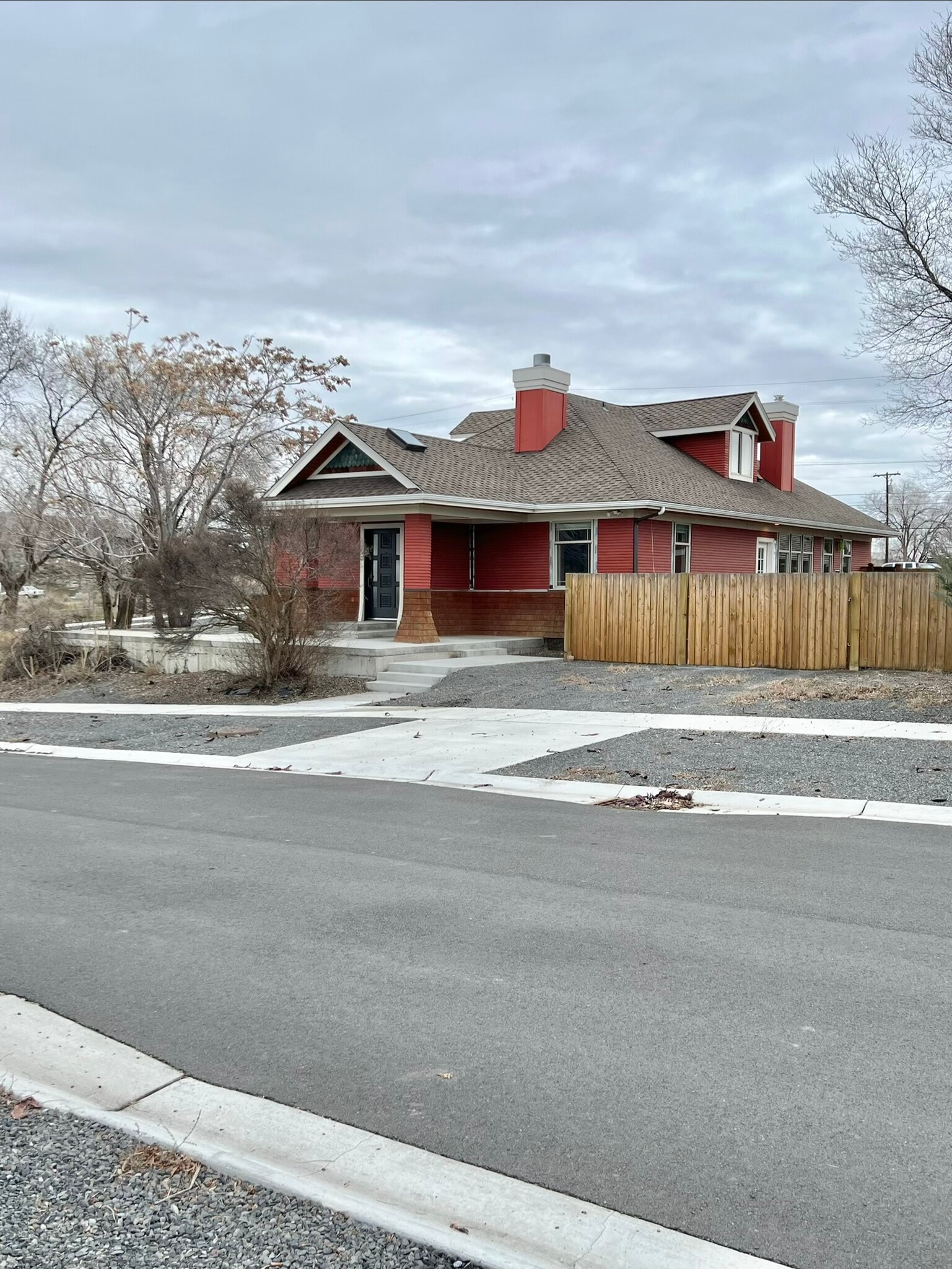 View of Front of home, parking in front of fence and plenty of street parking. - 24 Ash St N