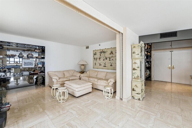 Building Photo - 10175 Collins Ave