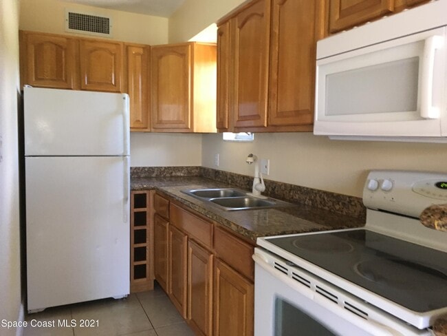 Building Photo - 250 N Banana River Dr