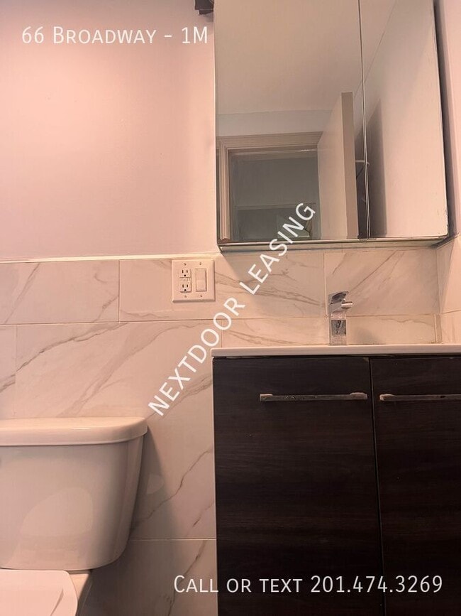 Building Photo - 66 Broadway-1M