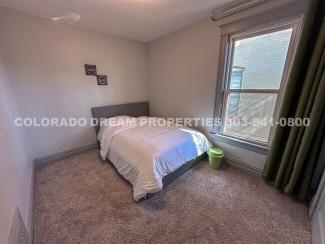 Building Photo - A home where old-world charm meets modern sophistication!