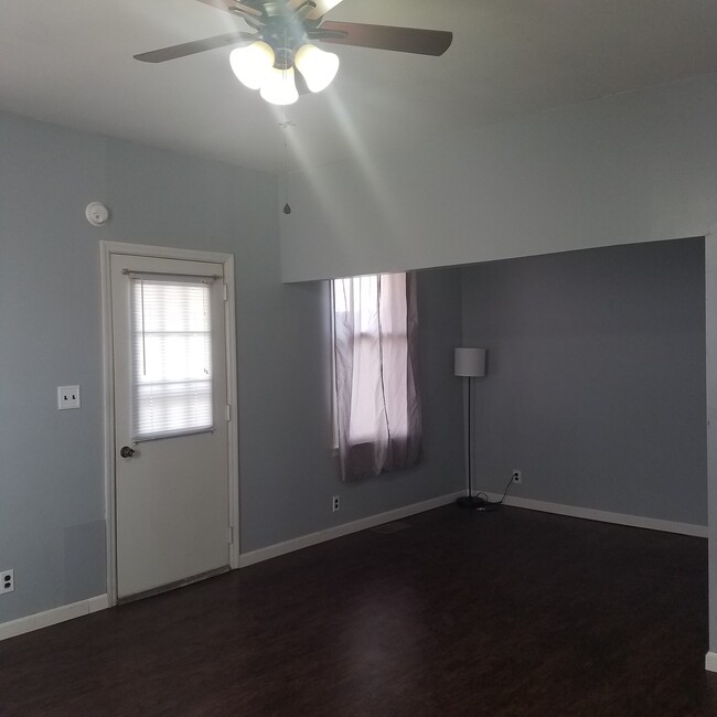 Living room looking at office space - 1201 E Walnut St