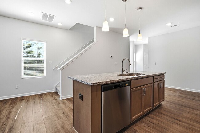 Building Photo - BRAND NEW TOWNHOME-9 FOOT CEILINGS-TWO CAR GARAGE-POOL COMMUNITY