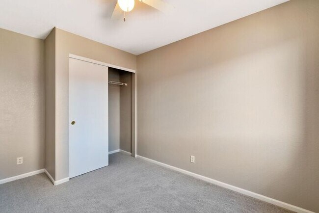 Building Photo - 3BR Townhome Near DIA & Light Rail | New Carpet, Garage & Fenced Patio