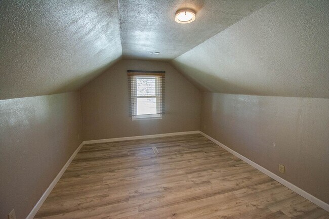 Building Photo - Fenced Yard, 2-Car Garage + Quiet Location!