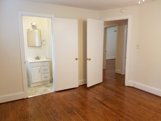 Master bedroom & master bath to hall view.. - 115 N Warren St
