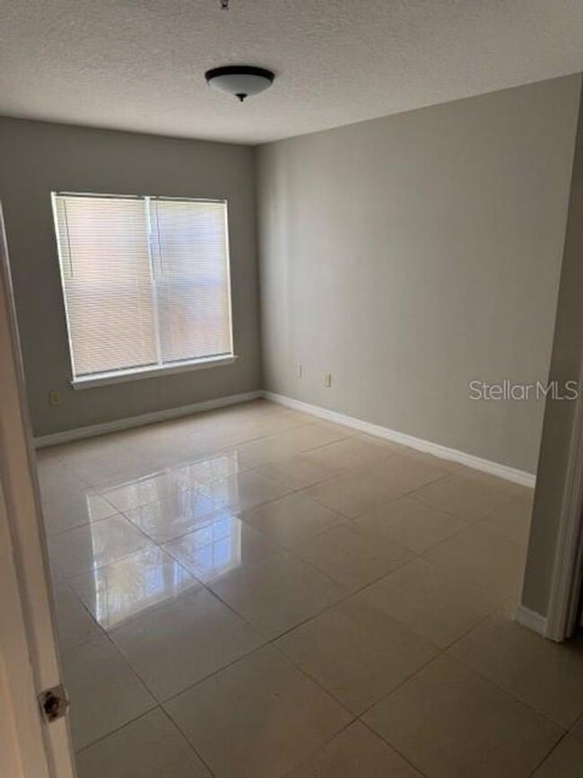 Building Photo - First-Floor 2-Bed, 2-Bath Condo Near Universal with Resort-Style Amenities