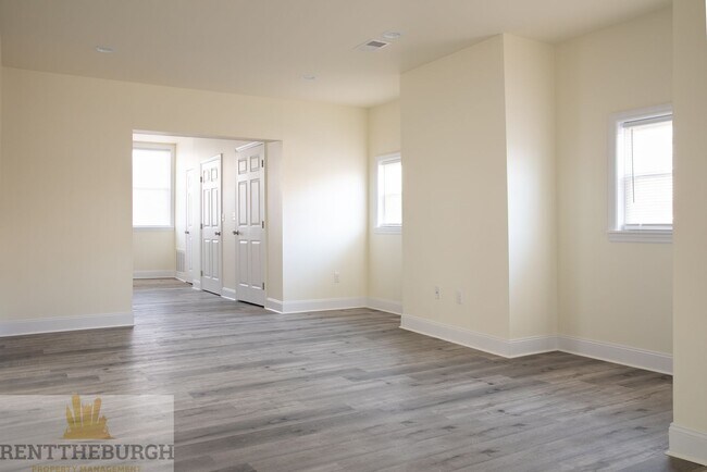 Building Photo - Updated 4BR House with 2 full baths and yard!