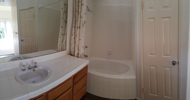 Building Photo - Bright and Airy 2-Bedroom, 2-Bathroom Condo
