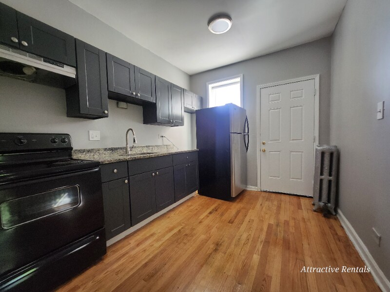 Building Photo - 6800 S Harper Ave