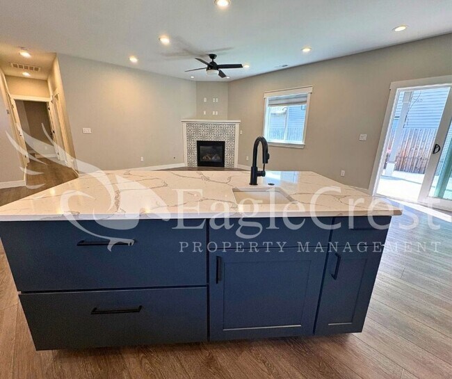 Building Photo - Contemporary Home With A Covered Patio & Quartz Countertops