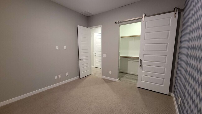 Bedroom + Walk-In Closet - 9741 E Tahoe Ave