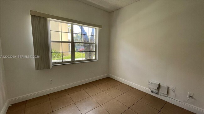 Building Photo - 661 Cypress Lake Blvd