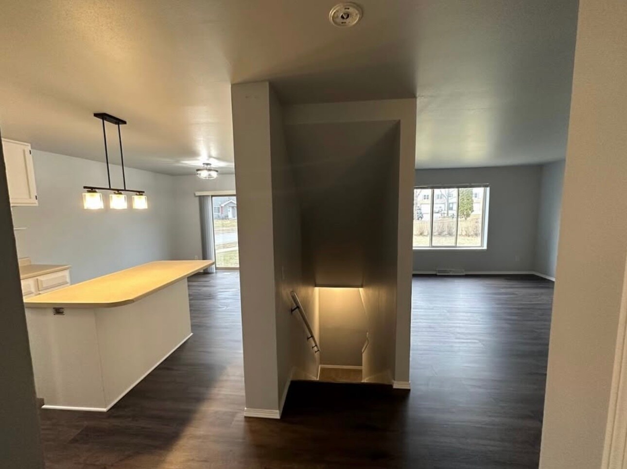 View from garage entrance. Livingroom to the right, kitchen to the left. Stairs to the basement. - 1507 Glacier Hill Dr