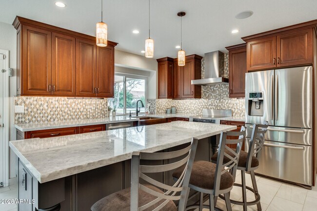 Building Photo - 10675 E Cinnabar Ave