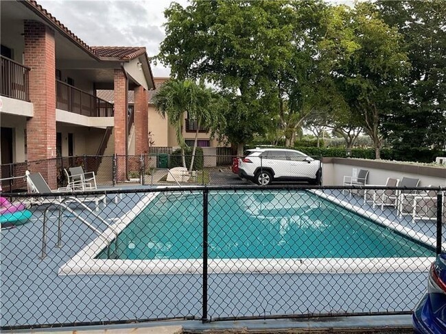 Building Photo - 10825 Royal Palm Blvd