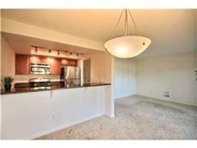 Building Photo - Quiet ground floor unit with access to lar...