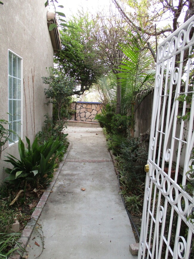 Building Photo - Beautiful Oasis-High Ceiling- Tile and Car...