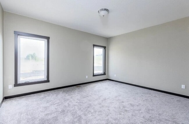 Building Photo - Newly Built 4 bedroom 3 bathroom Twinhome ...