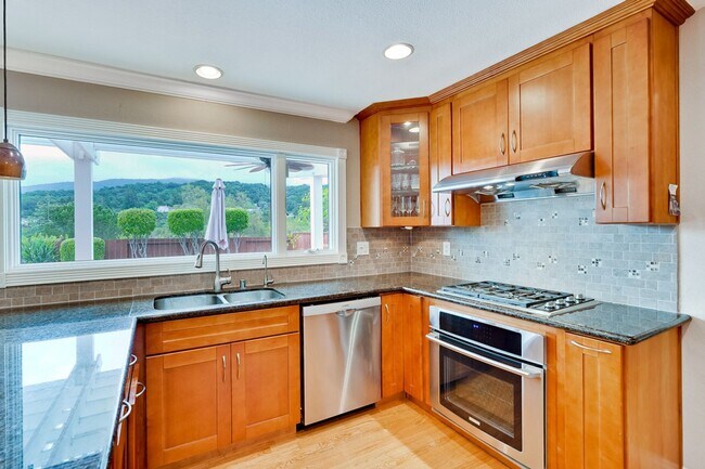 Building Photo - Remodeled 5 Bedroom Home with Heated Pool, Hillside Views, Solar, and Sunrise and Sunset Views in...