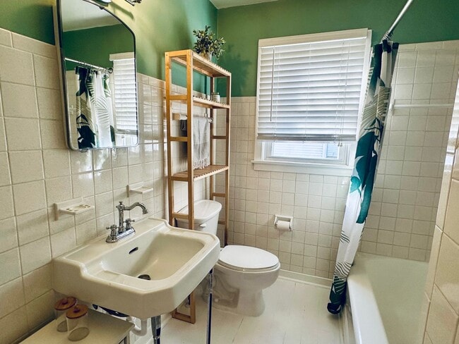 Building Photo - {8520} Charming Four Bedroom in Fantastic Location + Two Main Floor Bedrooms + Hardwood Floors + ...