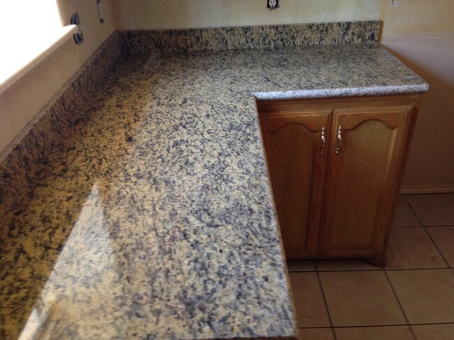 Granite on Kitchen and baths - 3706 Joby St