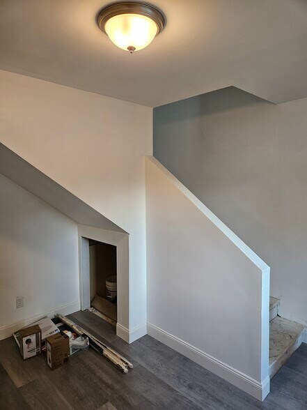 Looking from the kitchen into the living room and stairs. - 4304 Kateri Ln