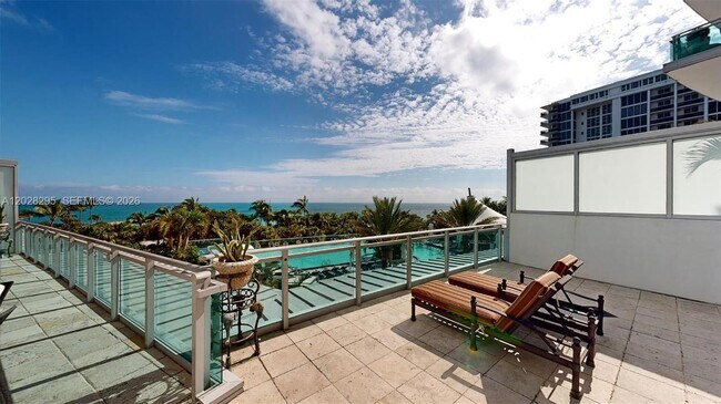 Building Photo - 10295 Collins Ave