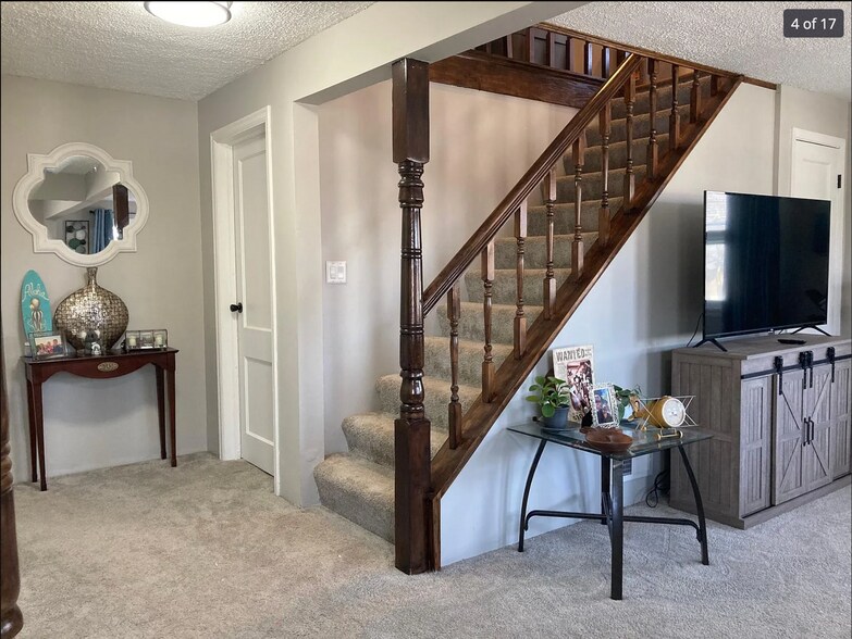 living room/stairs to loft - 1225 8th Ave NW