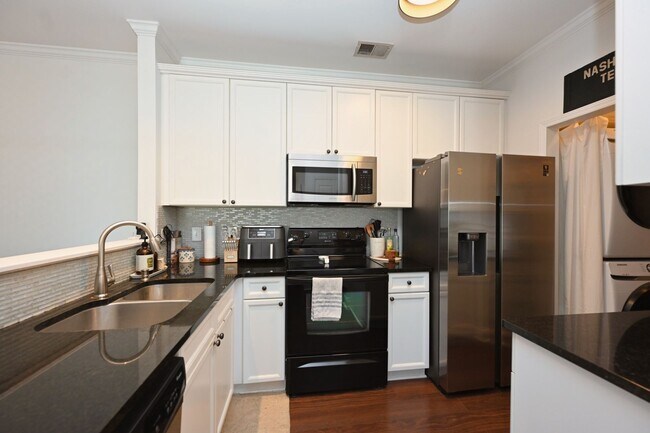 Building Photo - **SOPHISTICATED URBAN RETREAT IN THE HEART OF LENOX VILLAGE**