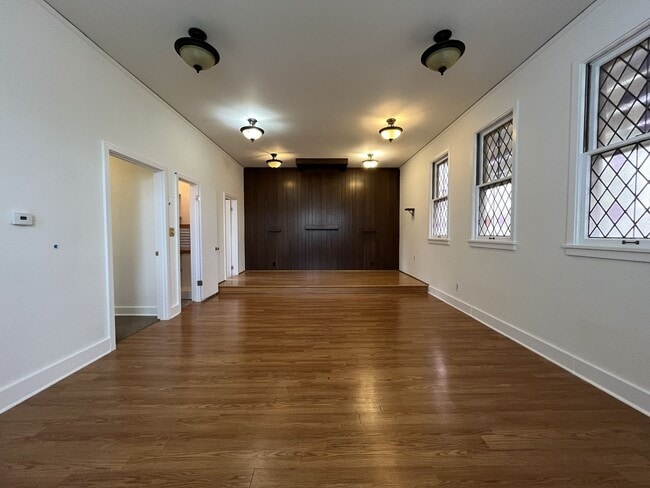 Building Photo - Expansive 4BR 2,900+ Sq Ft Home with Theater-Style Living Room & Bonus Hobby Workshop