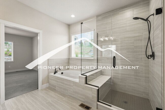 Building Photo - Main Floor Primary Home in Flying Horse with 5 Bedrooms, Gourmet Kitchen, Finished Basement & 4-C...