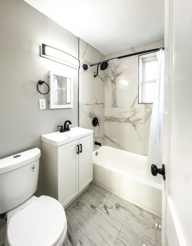 Building Photo - 5548 Woodland Ave