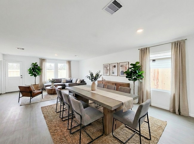 Building Photo - This great new single-story design makes smart use of the space available. At the front are all t...