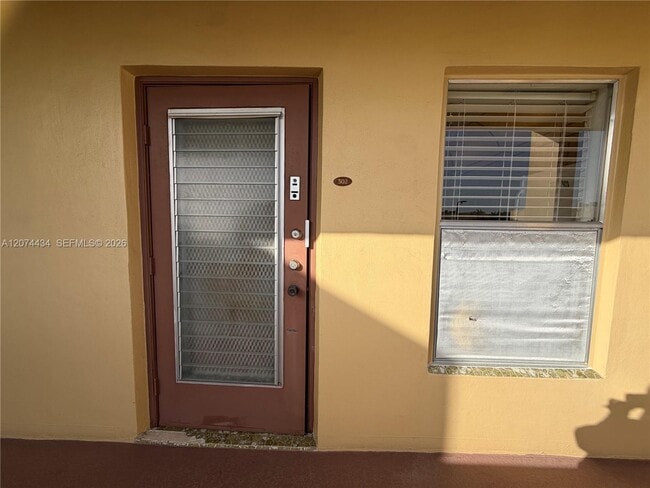 Building Photo - 5890 NW 64th Ave