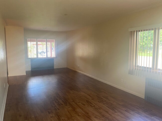 living room in 2 bedroom - Garden Apartments- All Utilities Included